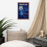 Framed 'Route 66' poster on a wall above a woven basket with books and a teddy bear.